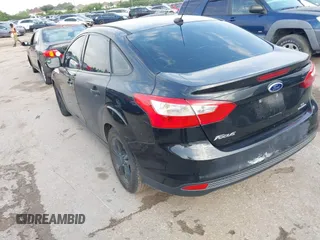 2014 Ford Focus SE with VIN 1FADP3F21EL157488, listed as a IAAI auction lot 42120325 with 198,658 mi miles and . Bid and sale history available at DreamBid. Image 3.