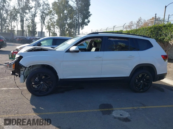 2023 Volkswagen Atlas SE z VIN 1V2WP2CA6PC533984, wystawiony jako IAAI lot #41021512 z przebiegiem 26 993 mil mil oraz . Historia ofert i sprzedaży dostępna na DreamBid. Obrazek 14.
