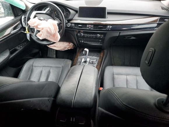 2016 BMW X5 xDrive35i z VIN 5UXKR0C58G0P33802, wystawiony jako Copart lot #52252845 z przebiegiem 115 228 mil mil oraz Szkoda całkowita • Salvage title. Historia ofert i sprzedaży dostępna na DreamBid. Obrazek 8.