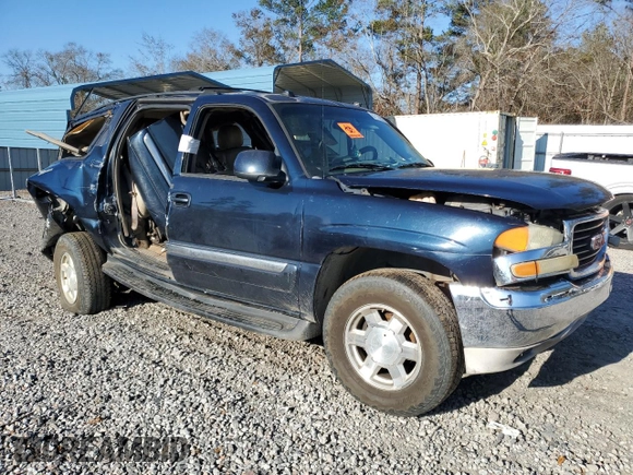 2004 GMC Yukon XL SLT with VIN 1GKEC16ZX4J107876, listed as a Copart auction lot 87132974 with 682,081 mi miles and Salvage Title. Bid and sale history available at carsss.com. Image 4.