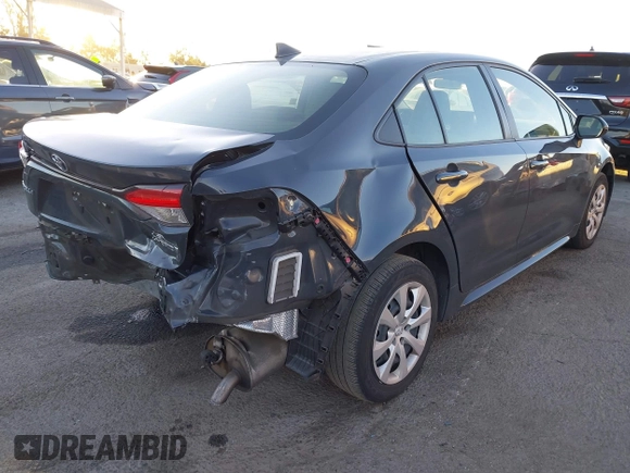 2023 Toyota Corolla Hybrid LE with VIN JTDBCMFE3P3020729, listed as a IAAI auction lot 41422018 with 79,069 mi miles. Bid and sale history available at carsss.com. Image 4.