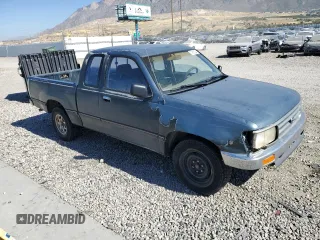 1995 Toyota T100 DX z VIN JT4VD12E0S0005758, wystawiony jako Copart lot #74018364 z przebiegiem 394 656 mil mil oraz Szkody całkowita. Historia ofert i sprzedaży dostępna na DreamBid. Obrazek 4.