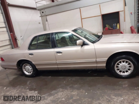 1997 Mercury Grand Marquis LS with VIN 2MELM75W2VX692003, listed as a IAAI auction lot 41547614 with 148,499 mi miles and . Bid and sale history available at DreamBid. Image 13.