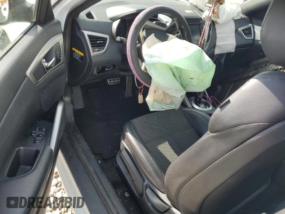 2016 Hyundai Veloster z VIN KMHTC6AD2GU272413, wystawiony jako Copart lot #55530805 z przebiegiem Nie podano mil oraz Szkoda całkowita • Salvage title. Historia ofert i sprzedaży dostępna na DreamBid. Obrazek 8.