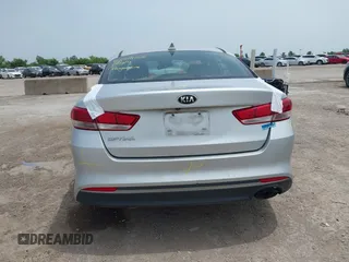 2017 Kia Optima LX z VIN 5XXGT4L34HG124656, wystawiony jako IAAI lot #42247907 z przebiegiem 93 333 mil mil oraz . Historia ofert i sprzedaży dostępna na DreamBid. Obrazek 16.