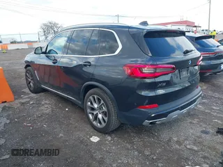 2020 BMW X5 xDrive40i with VIN 5UXCR6C08L9B56211, listed as a IAAI auction lot 41967486 with 51,973 mi miles. Bid and sale history available at carsss.com. Image 3.