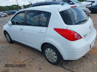 2009 Nissan Versa 1.8 SL with VIN 3N1BC13E99L482130, listed as a IAAI auction lot 39805902 with 123,363 mi miles. Bid and sale history available at carsss.com. Image 3.