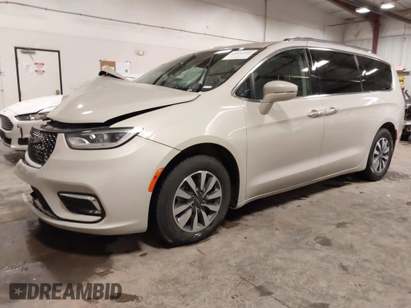 2021 Chrysler Pacifica Touring L with VIN 2C4RC1BG7MR531772, listed as a IAAI auction lot 41834392 with 156,123 mi miles and . Bid and sale history available at DreamBid. Image 21.