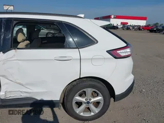 2015 Ford Edge SE z VIN 2FMTK3G92FBC22197, wystawiony jako IAAI lot #42578472 z przebiegiem 100 878 mil mil oraz . Historia ofert i sprzedaży dostępna na DreamBid. Obrazek 13.