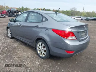 2014 Hyundai Accent GLS with VIN KMHCU4AE9EU761298, listed as a IAAI auction lot 42186032 with 118,848 mi miles and . Bid and sale history available at carsss.com. Image 3.