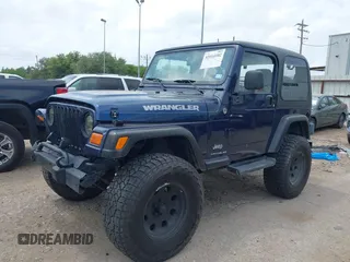 2005 Jeep Wrangler X with VIN 1J4FA39S15P320367, listed as a IAAI auction lot 42114102 with 142,132 mi miles and . Bid and sale history available at DreamBid. Image 2.