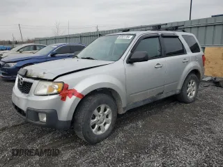 2011 Mazda Tribute Touring with VIN 4F2CY0C71BKM06441, listed as a Copart auction lot 82831764 with 226,888 mi miles and Clean Title. Bid and sale history available at carsss.com. Image 1.