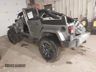 2014 Jeep Wrangler Unlimited Sahara with VIN 1C4BJWEG4EL229284, listed as a IAAI auction lot 40841730 with 1 mi miles. Bid and sale history available at carsss.com. Image 3.