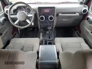 2008 Jeep Wrangler Unlimited Sahara z VIN 1J8GA59108L648333, wystawiony jako Copart lot #57430015 z przebiegiem 506 770 mil mil oraz Czysty tytuł • Clean title. Historia ofert i sprzedaży dostępna na DreamBid. Obrazek 8.