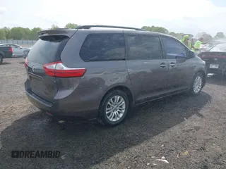 2016 Toyota Sienna XLE with VIN 5TDYK3DC4GS708455, listed as a IAAI auction lot 41914114 with 140,451 mi miles. Bid and sale history available at carsss.com. Image 4.
