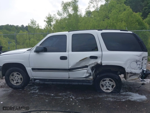2005 Chevrolet Tahoe Z71 with VIN 1GNEC13T85R203611, listed as a IAAI auction lot 39482026 with 264,918 mi miles. Bid and sale history available at carsss.com. Image 15.