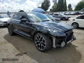 2021 Aston Martin DBX with VIN SCFVUJAW7MTV03341, listed as a Copart auction lot 71015804 with 12,324 mi miles and Salvage Title. Bid and sale history available at carsss.com. Image 4.