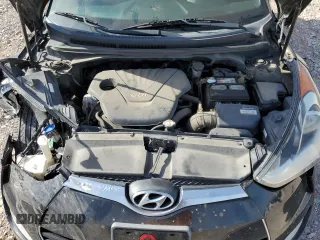 2016 Hyundai Veloster z VIN KMHTC6AD1GU293530, wystawiony jako Copart lot #53137985 z przebiegiem 151 003 mil mil oraz Szkody całkowita. Historia ofert i sprzedaży dostępna na DreamBid. Obrazek 13.