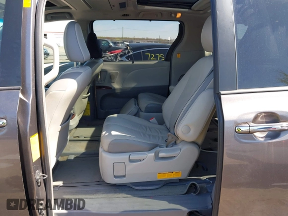 2013 Toyota Sienna XLE with VIN 5TDDK3DC0DS059036, listed as a IAAI auction lot 42069896 with 124,105 mi miles and . Bid and sale history available at DreamBid. Image 8.