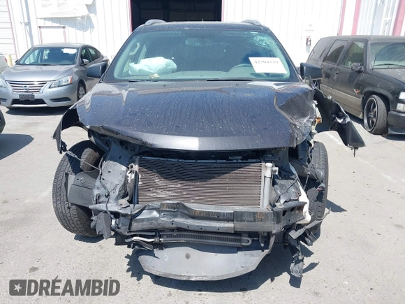 2017 Chevrolet Traverse LS z VIN 1GNKRFED1HJ154839, wystawiony jako IAAI lot #42304339 z przebiegiem Nie podano mil oraz . Historia ofert i sprzedaży dostępna na DreamBid. Obrazek 11.