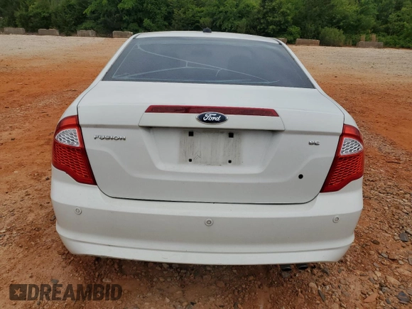 2012 Ford Fusion SE z VIN 3FAHP0HAXCR132060, wystawiony jako Copart lot #56148395 z przebiegiem 172 160 mil mil oraz Czysty tytuł • Clean title. Historia ofert i sprzedaży dostępna na DreamBid. Obrazek 6.