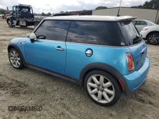 2003 MINI Hardtop S with VIN WMWRE33483TD64131, listed as a Copart auction lot 57428065 with 138,384 mi miles and Clean Title. Bid and sale history available at DreamBid. Image 2.