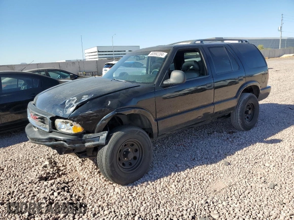 1997 GMC Jimmy SLS with VIN 1GKDT13W8V2560329, listed as a Copart auction lot 80992204 with 231,051 mi miles and Salvage Title. Bid and sale history available at carsss.com. Image 1.