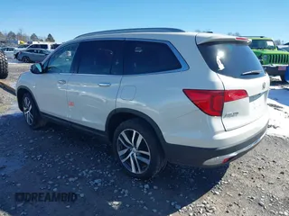 2017 Honda Pilot Touring with VIN 5FNYF6H95HB094641, listed as a IAAI auction lot 41531652 with 97,615 mi miles. Bid and sale history available at carsss.com. Image 3.