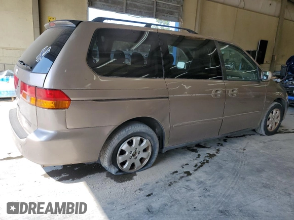 2003 Honda Odyssey EX-L with VIN 5FNRL18963B087397, listed as a Copart auction lot 62392415 with 261,737 mi miles and Salvage title. Bid and sale history available at DreamBid. Image 3.