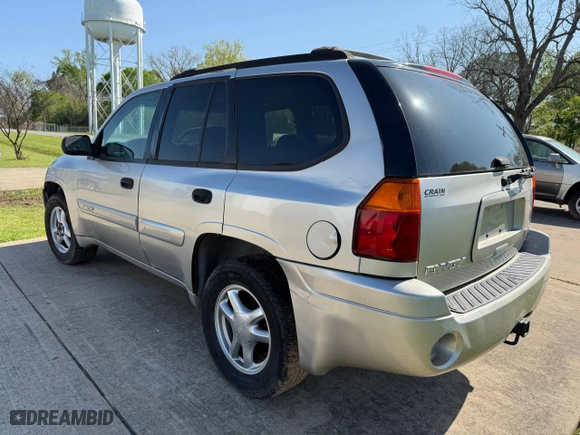 2004 GMC Envoy SLT with VIN 1GKDS13S742190702, listed as a Copart auction lot 52557035 with 202,843 mi miles and Clean Title. Bid and sale history available at carsss.com. Image 3.