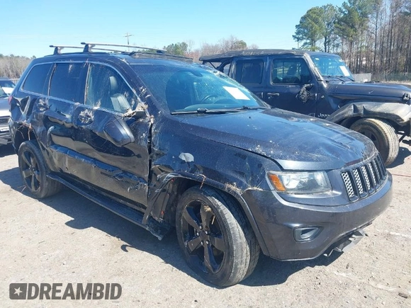 2014 Jeep Grand Cherokee Laredo with VIN 1C4RJEAG0EC580675, listed as a IAAI auction lot 41773879 with 127,714 mi miles. Bid and sale history available at carsss.com. Image 1.