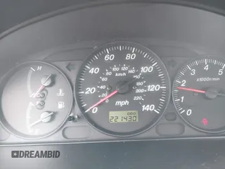 2000 Mazda Protege DX with VIN JM1BJ2223Y0212144, listed as a IAAI auction lot 41570436 with 221,430 mi miles and . Bid and sale history available at DreamBid. Image 7.