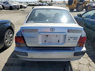 1995 Toyota Tercel DX z VIN JT2EL56E7S7011335, wystawiony jako Copart lot #67978774 z przebiegiem 182 025 mil mil oraz Szkoda całkowita • Salvage title. Historia ofert i sprzedaży dostępna na DreamBid. Obrazek 6.