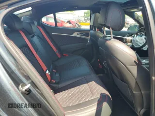 2023 Genesis G70 3.3T with VIN KMTG54TE3PU117672, listed as a Copart auction lot 63418684 with 19,899 mi miles and Salvage Title. Bid and sale history available at carsss.com. Image 10.