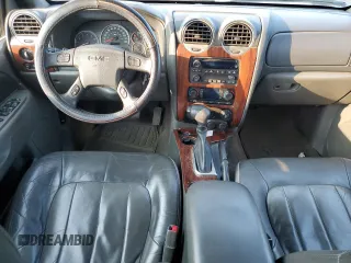 2004 GMC Envoy SLT with VIN 1GKDT13S942407244, listed as a Copart auction lot 70995064 with 162,676 mi miles and Salvage Title. Bid and sale history available at carsss.com. Image 8.