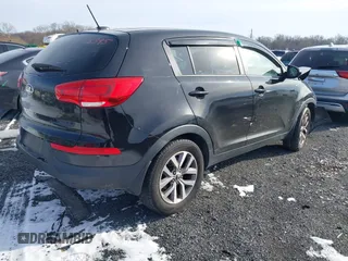2016 Kia Sportage LX with VIN KNDPBCAC6G7853992, listed as a IAAI auction lot 41292698 with 106,803 mi miles and . Bid and sale history available at carsss.com. Image 4.