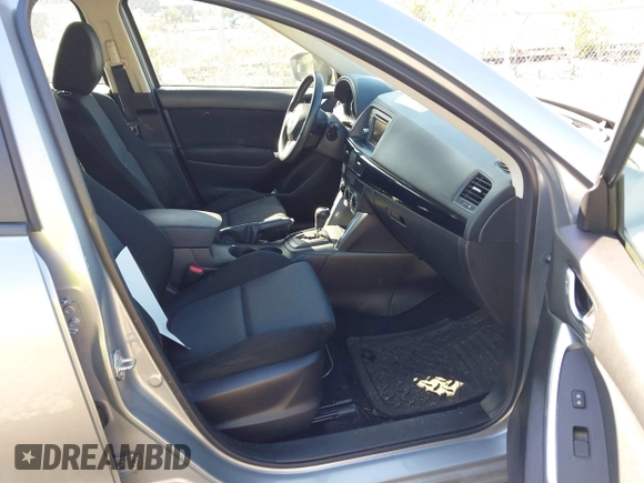 2013 Mazda CX-5 Sport with VIN JM3KE4BE0D0125748, listed as a IAAI auction lot 42143020 with 158,580 mi miles. Bid and sale history available at carsss.com. Image 5.