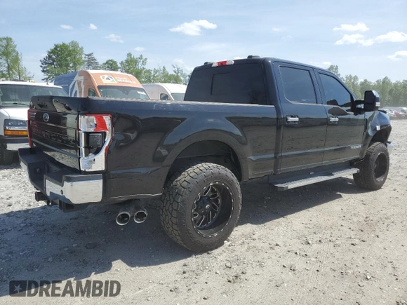 2021 Ford Super Duty F-250 SRW XL with VIN 1FT7W2BT1MEC51277, listed as a Copart auction lot 54199165 with 99,324 mi miles and Salvage Title. Bid and sale history available at carsss.com. Image 3.