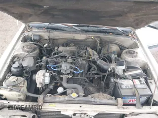 1985 Toyota Camry z VIN JT2SV16E9F0351378, wystawiony jako IAAI lot #42194705 z przebiegiem 192 476 mil mil oraz . Historia ofert i sprzedaży dostępna na DreamBid. Obrazek 10.