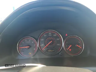 2003 Honda Civic LX with VIN 1HGEM21513L052399, listed as a Copart auction lot 77002124 with 158,029 mi miles and Salvage Title. Bid and sale history available at DreamBid. Image 9.