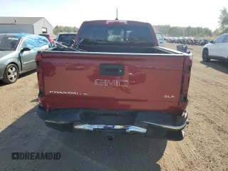 2020 GMC Canyon 4WD SLE with VIN 1GTG6CEN8L1172097, listed as a Copart auction lot 75794664 with 57,814 mi miles and Salvage Title. Bid and sale history available at carsss.com. Image 6.
