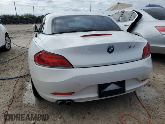 2011 BMW Z4 sDrive30i with VIN WBALM5C54BE379870, listed as a Copart auction lot 74458414 with Not provided miles and Non repairable. Bid and sale history available at DreamBid. Image 6.