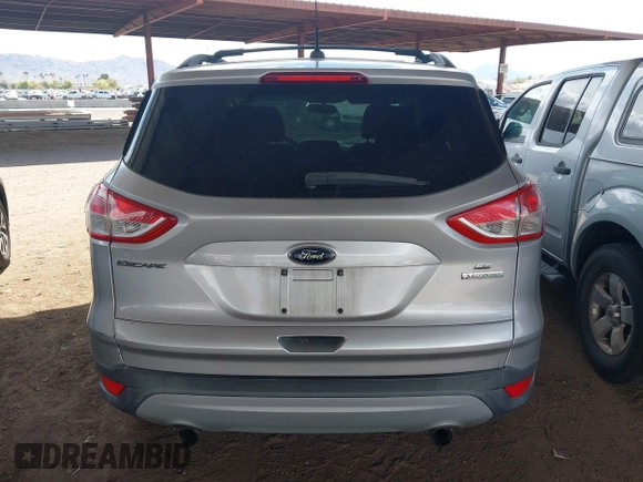 2013 Ford Escape SE with VIN 1FMCU0GX9DUB83512, listed as a IAAI auction lot 41970256 with 69,897 mi miles and . Bid and sale history available at DreamBid. Image 16.