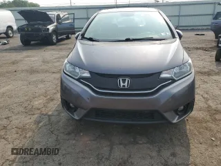 2015 Honda Fit EX-L z VIN 3HGGK5H83FM757658, wystawiony jako Copart lot #59907425 z przebiegiem 139 053 mil mil oraz Szkoda całkowita • Salvage title. Historia ofert i sprzedaży dostępna na DreamBid. Obrazek 5.