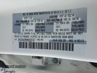 2021 Mazda CX-30 Premium z VIN 3MVDMADM5MM228747, wystawiony jako Copart lot #51747475 z przebiegiem 13 562 mil mil oraz Nie do naprawy • Non repairable. Historia ofert i sprzedaży dostępna na DreamBid. Obrazek 14.