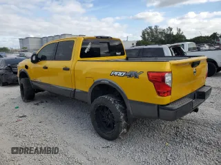 2016 Nissan Titan XD PRO-4X with VIN 1N6BA1F47GN509342, listed as a Copart auction lot 84259474 with 192,684 mi miles and Clean Title. Bid and sale history available at carsss.com. Image 2.