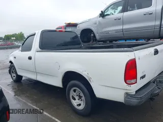 2002 Ford F-150 XL with VIN 1FTRF17242NB86232, listed as a IAAI auction lot 42336859 with 119,321 mi miles and . Bid and sale history available at DreamBid. Image 14.