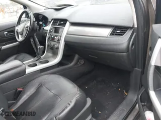 2012 Ford Edge SEL with VIN 2FMDK3J9XCBA67679, listed as a IAAI auction lot 41690401 with 191,536 mi miles. Bid and sale history available at carsss.com. Image 5.