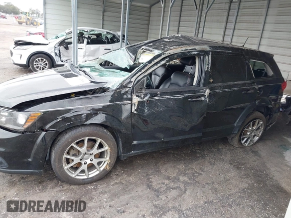 2015 Dodge Journey R/T with VIN 3C4PDDEG3FT555035, listed as a IAAI auction lot 41067936 with 214,244 mi miles and . Bid and sale history available at DreamBid. Image 14.