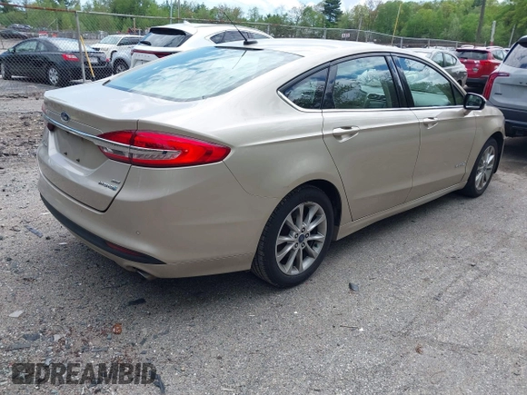 2017 Ford Fusion Hybrid SE с VIN 3FA6P0LU4HR301943, выставлен на аукционе IAAI как лот 42217709 с пробегом 102 791 миль миль и . История ставок и продаж доступна на DreamBid. Изображение 4.